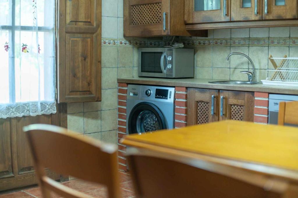 Kuchyň nebo kuchyňský kout v ubytování Villa Las Ardillas