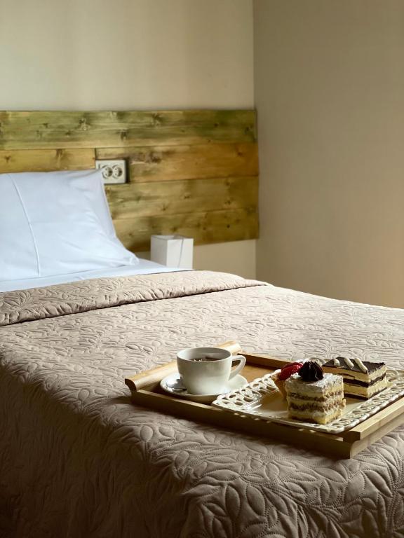 Postel nebo postele na pokoji v ubytování Hotel Ailama Mestia