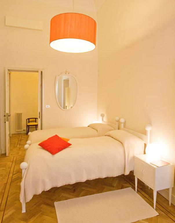 Postel nebo postele na pokoji v ubytování Malìa bed and breakfast