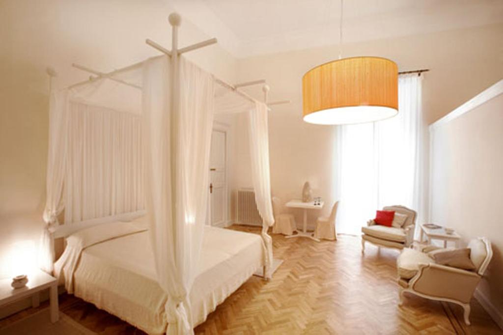 Postel nebo postele na pokoji v ubytování Malìa bed and breakfast