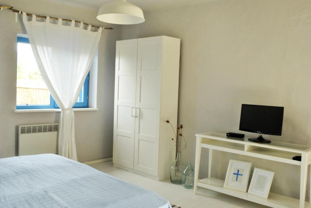 Postel nebo postele na pokoji v ubytování Limanul Resort - Danube Delta