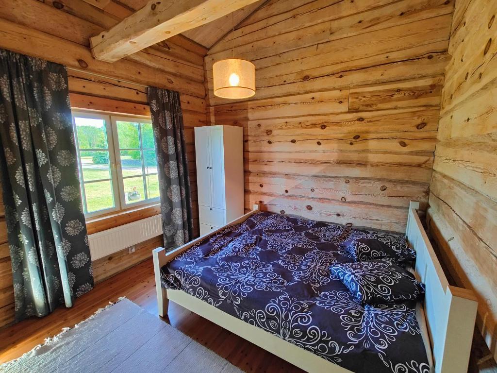 Postel nebo postele na pokoji v ubytování George Holiday Home