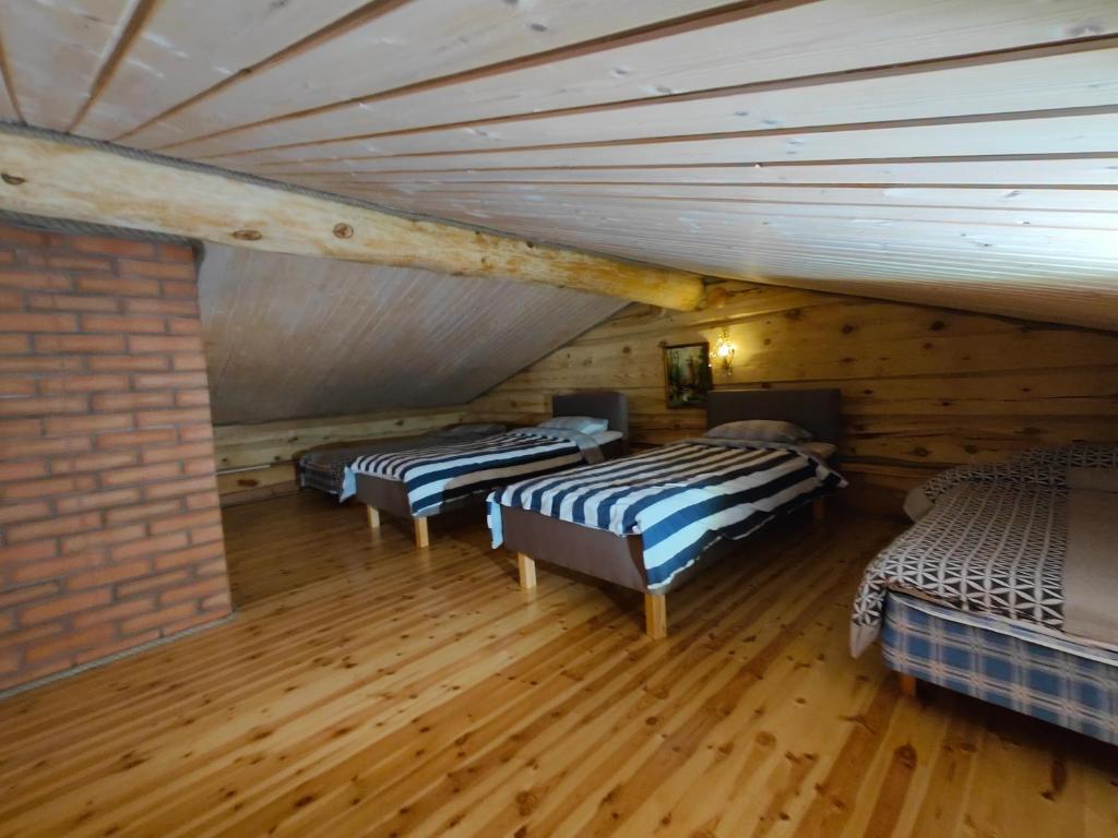 Postel nebo postele na pokoji v ubytování George Holiday Home