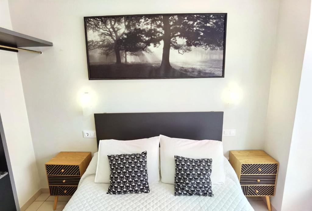 Postel nebo postele na pokoji v ubytování HOSTAL RIGAU