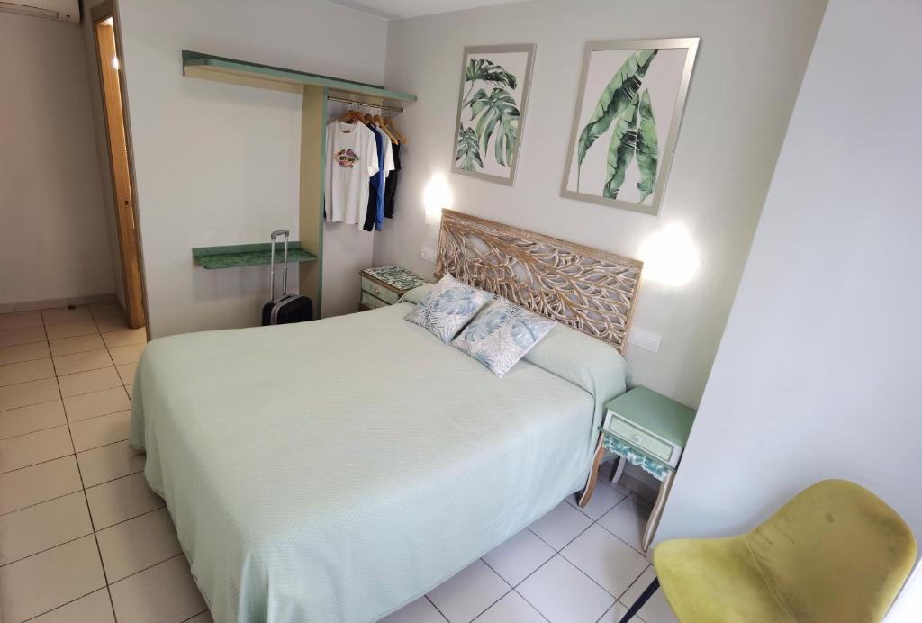 Postel nebo postele na pokoji v ubytování HOSTAL RIGAU