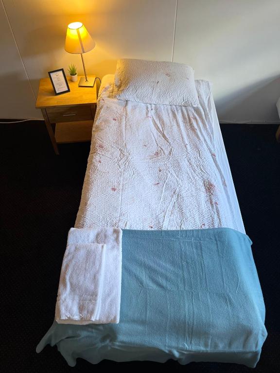 Postel nebo postele na pokoji v ubytování Engimyri Lodge