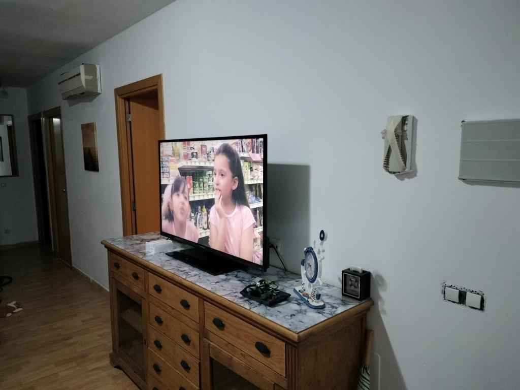 Televízia a/alebo spoločenská miestnosť v ubytovaní Villazen