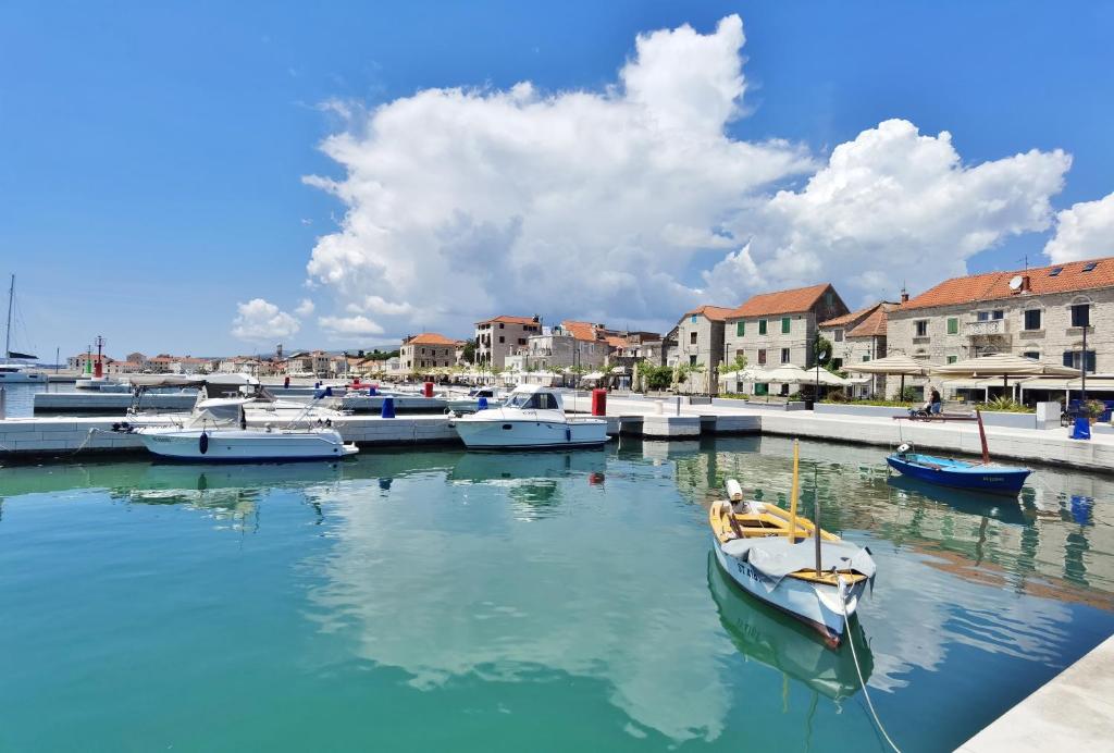 a group of boats are docked in a harbor at Holiday home Kastel Stari in Kaštela