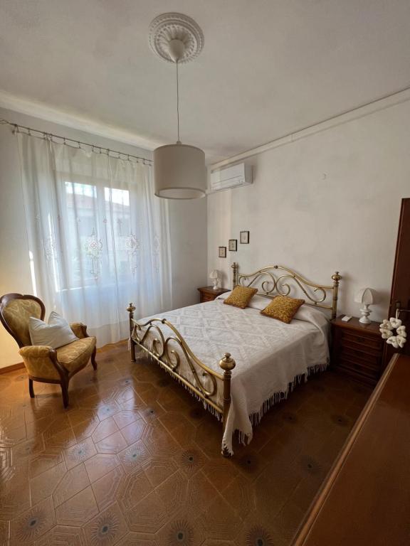 A bed or beds in a room at Casa Vanni