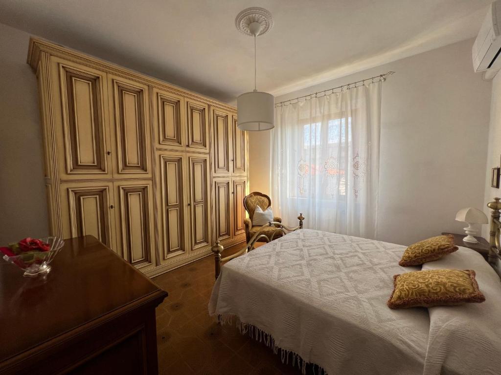 A bed or beds in a room at Casa Vanni