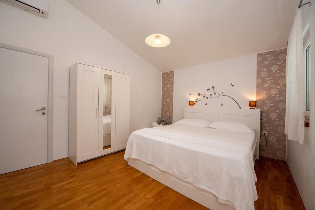 Posteľ alebo postele v izbe v ubytovaní Holiday Home Andrija