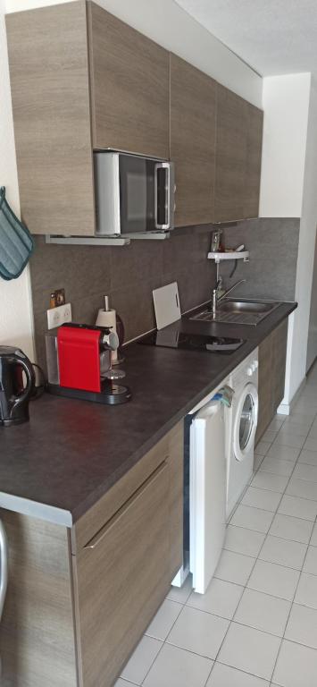Kuchyňa alebo kuchynka v ubytovaní Appartement Vias-Plage