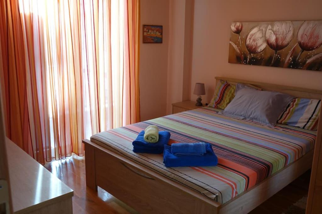 Ένα ή περισσότερα κρεβάτια σε δωμάτιο στο Nancy's house at Charilaou