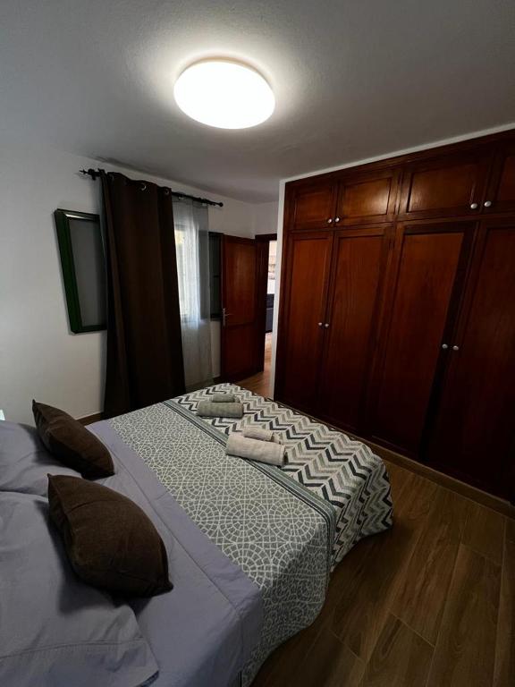 Postel nebo postele na pokoji v ubytování El Caseto