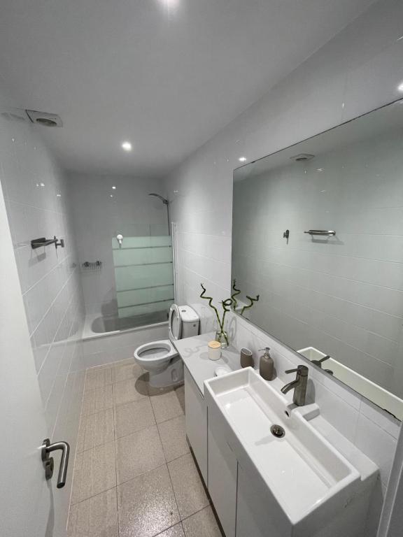 Koupelna v ubytování Arena, exquisito apartamento con aire acondicionado en la playa