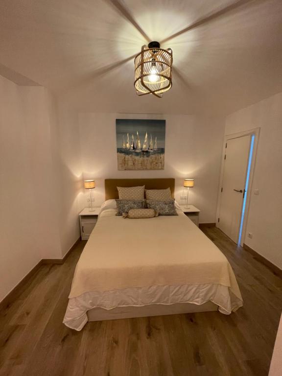 Postel nebo postele na pokoji v ubytování Arena, exquisito apartamento con aire acondicionado en la playa