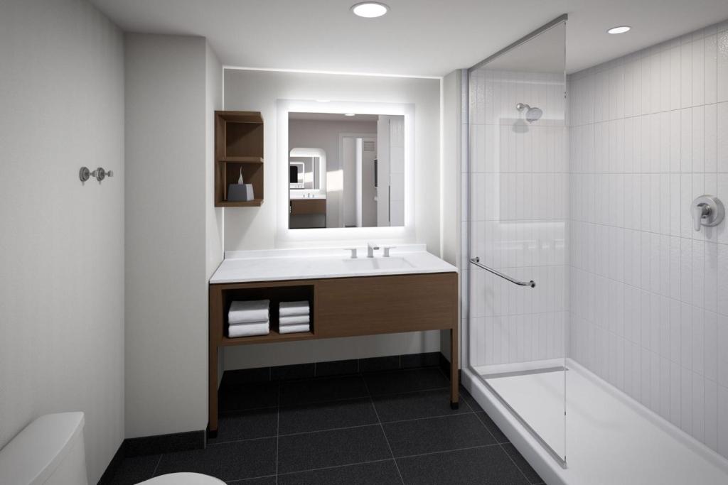 a bathroom with a sink and a shower at Staybridge Suites Winter Haven - Auburndale in Winter Haven