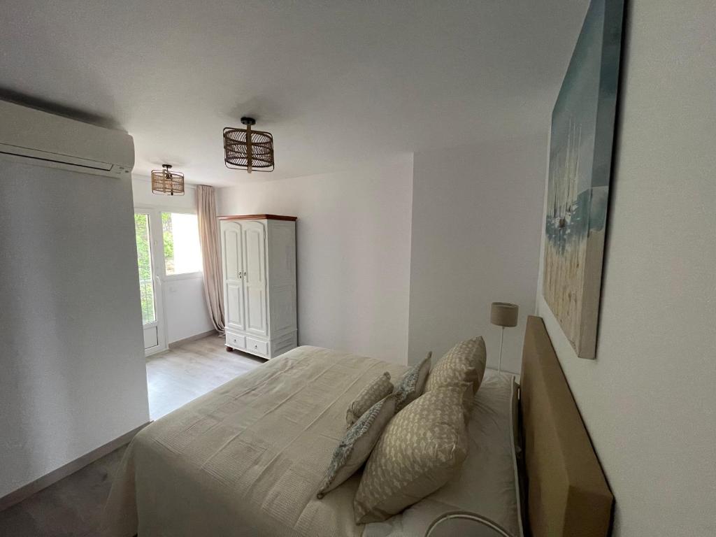 Postel nebo postele na pokoji v ubytování Arena, exquisito apartamento con aire acondicionado en la playa