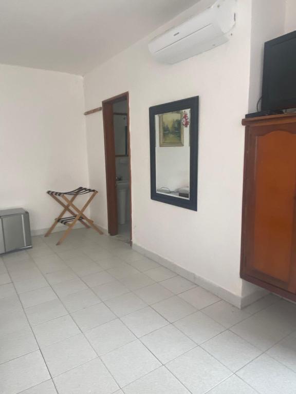 TV a/nebo společenská místnost v ubytování Hotel Villa Ricaurte