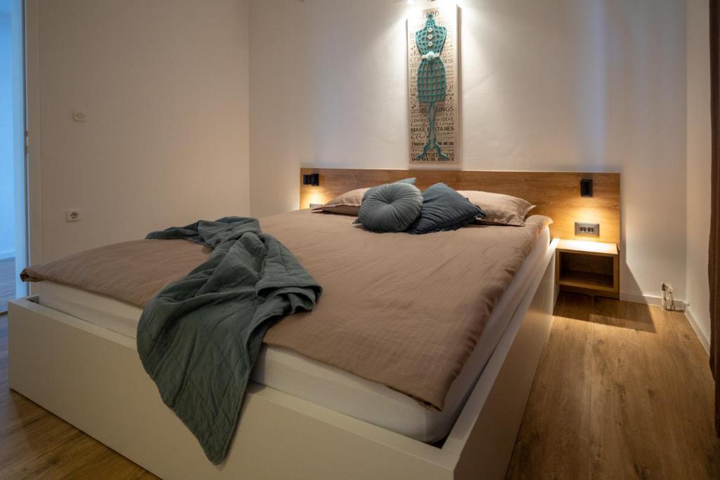 Posteľ alebo postele v izbe v ubytovaní Lea Apartments