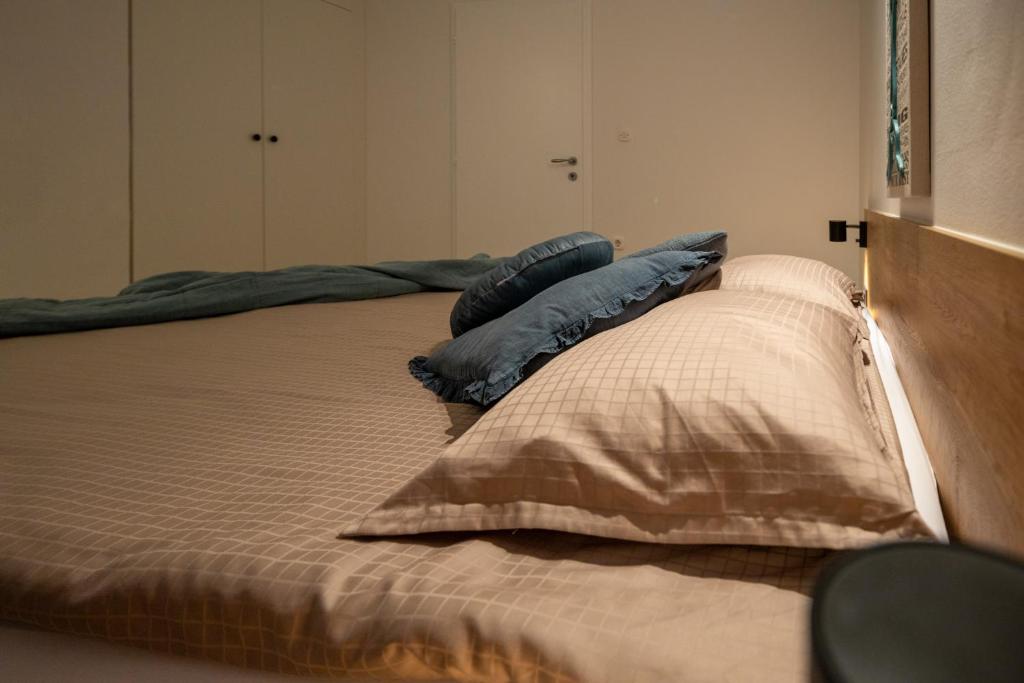 Posteľ alebo postele v izbe v ubytovaní Lea Apartments