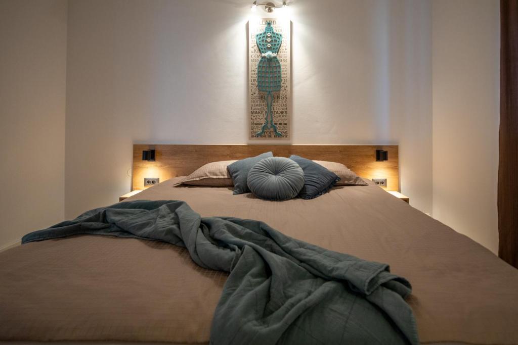 Posteľ alebo postele v izbe v ubytovaní Lea Apartments