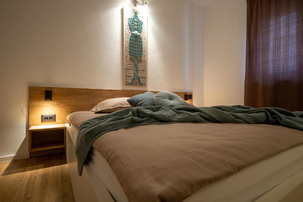 Posteľ alebo postele v izbe v ubytovaní Lea Apartments