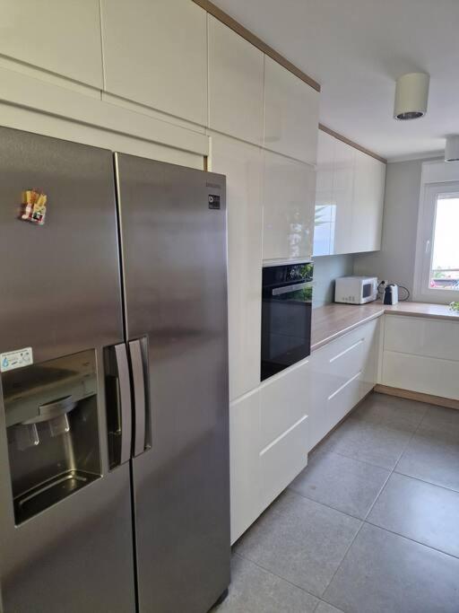 Kuchyňa alebo kuchynka v ubytovaní Magnifique Duplex vue mer