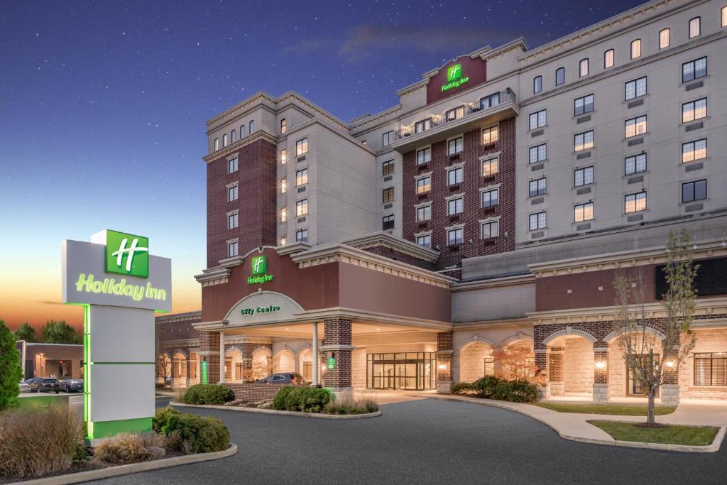 eine Darstellung der Fassade eines Hotels in der Unterkunft Holiday Inn Lafayette-City Centre, an IHG Hotel in Lafayette