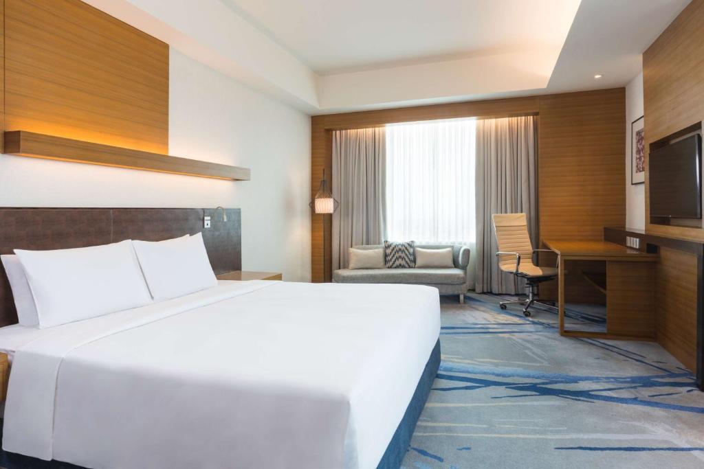 Llit o llits en una habitació de Radisson Blu Cebu