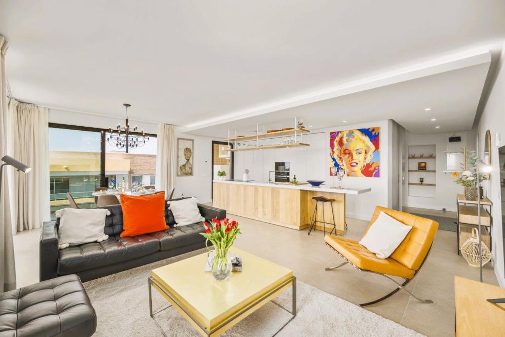 Image showcasing Luxury 3-Bed Penthouse with Ocean Views, Terrace & Pool, Quarteira ...