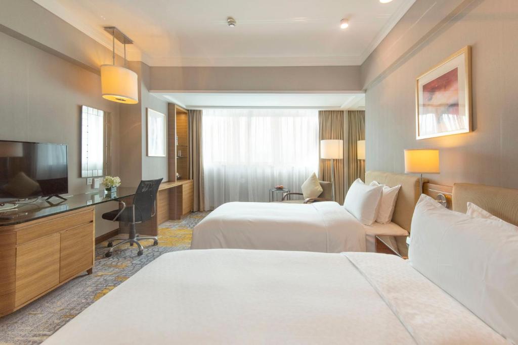 Postel nebo postele na pokoji v ubytování Four Points by Sheraton Shanghai, Pudong