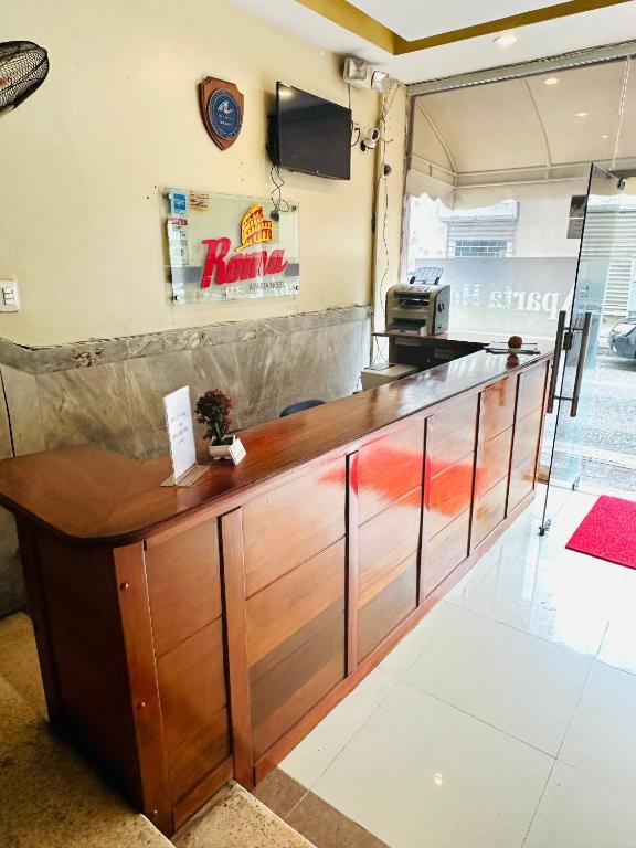 TV a/nebo společenská místnost v ubytování Aparta Hotel Roma