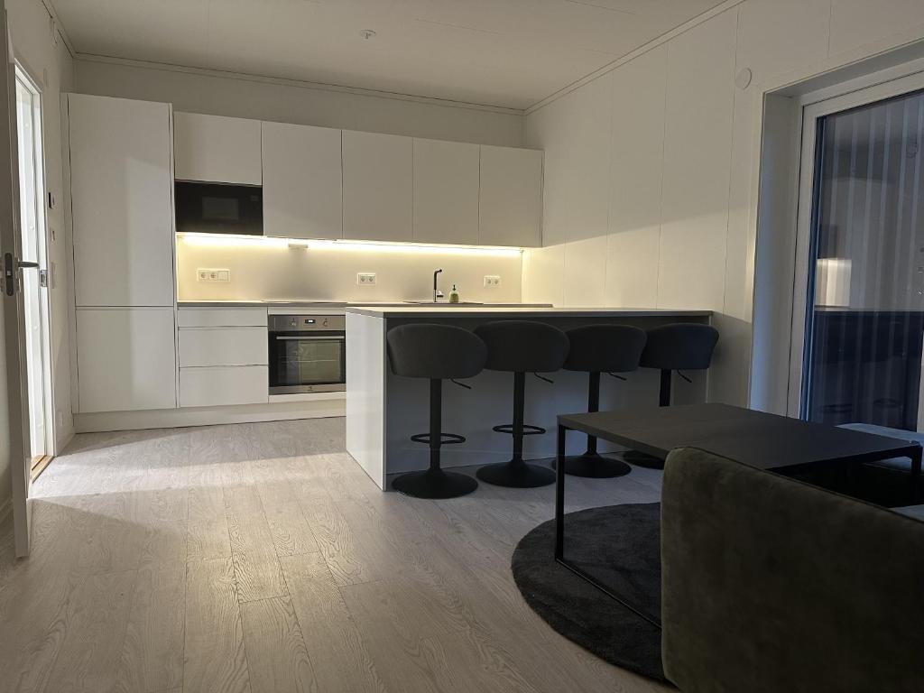 Kuchyň nebo kuchyňský kout v ubytování Brand new apartment in Svolvær