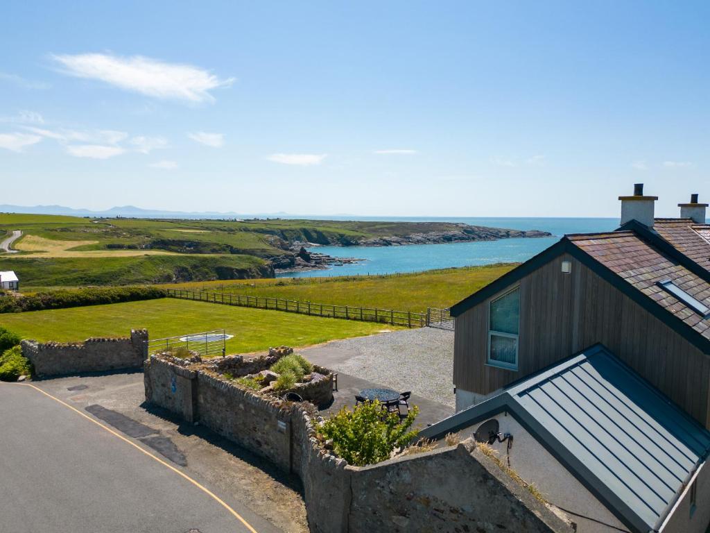 a house with a view of the ocean at Ty Nant in Holyhead