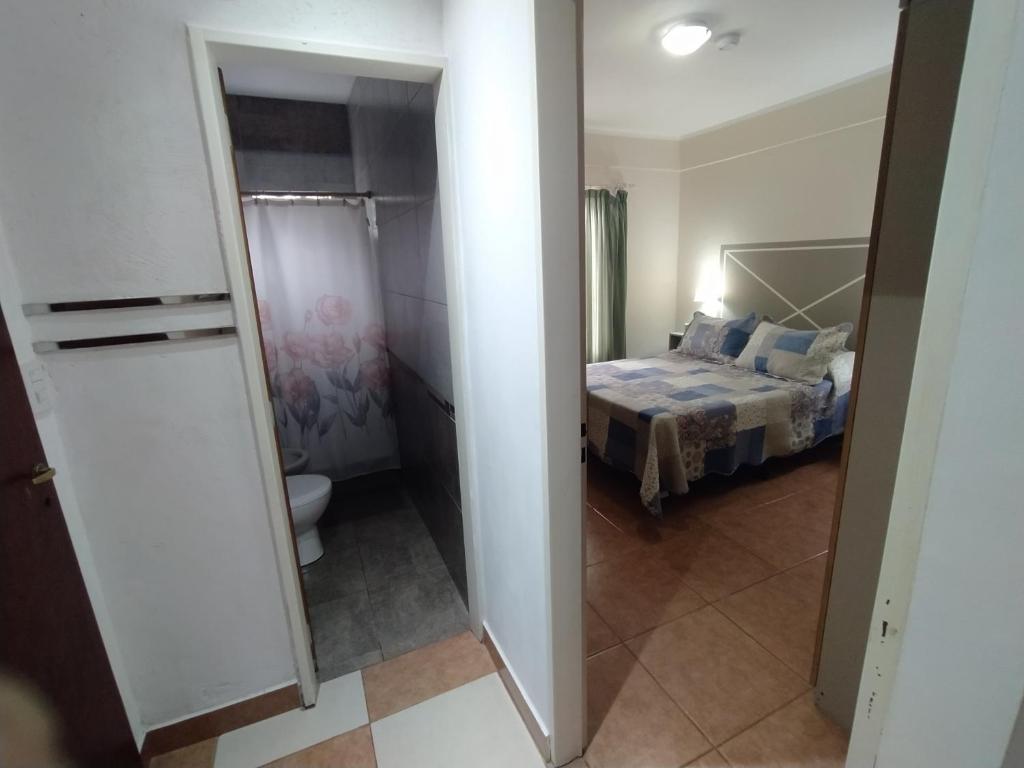Postel nebo postele na pokoji v ubytování Puñadito de descanso