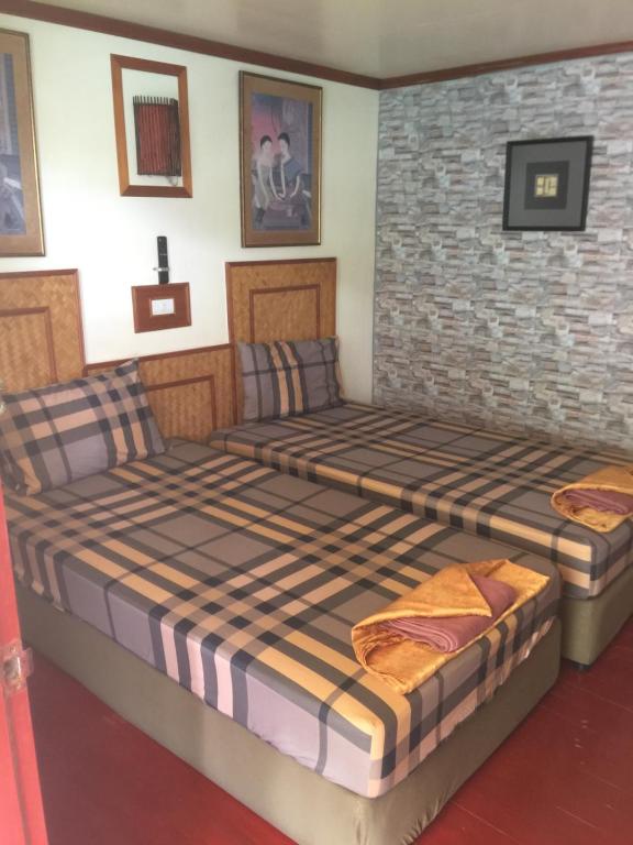 Postel nebo postele na pokoji v ubytování Phi Phi Dream Guest House