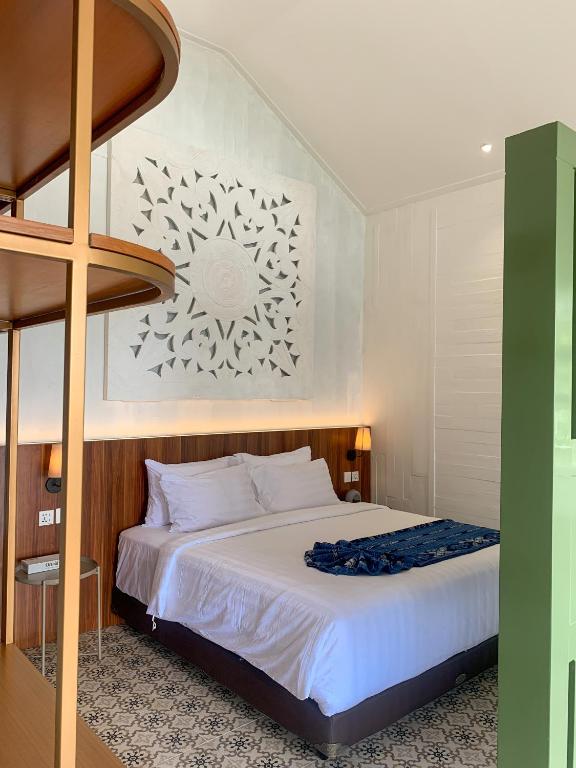Postel nebo postele na pokoji v ubytování Gracia Spa Resort Hotel