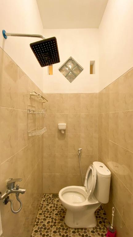 Koupelna v ubytování Nitha Homestay