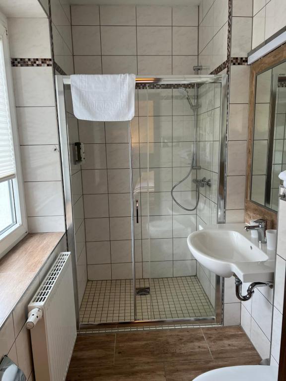 Koupelna v ubytování Hotel Medaillon