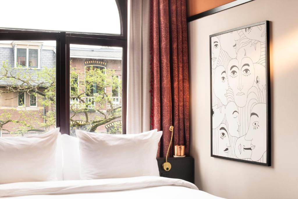 Postel nebo postele na pokoji v ubytování Jan Luyken Amsterdam