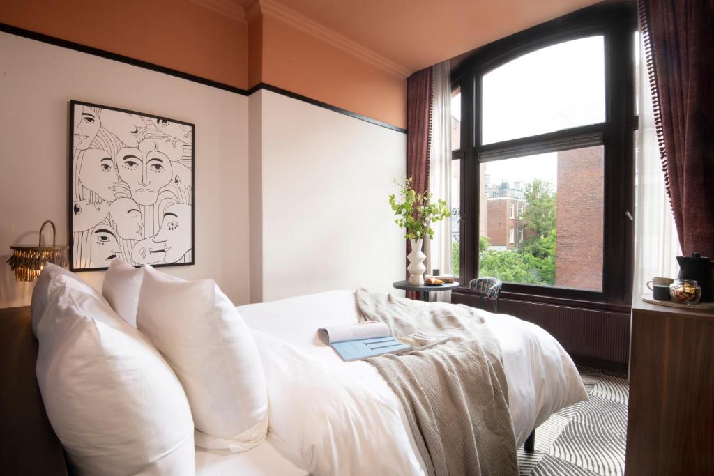 Postel nebo postele na pokoji v ubytování Jan Luyken Amsterdam