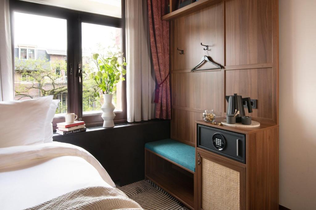 Postel nebo postele na pokoji v ubytování Jan Luyken Amsterdam