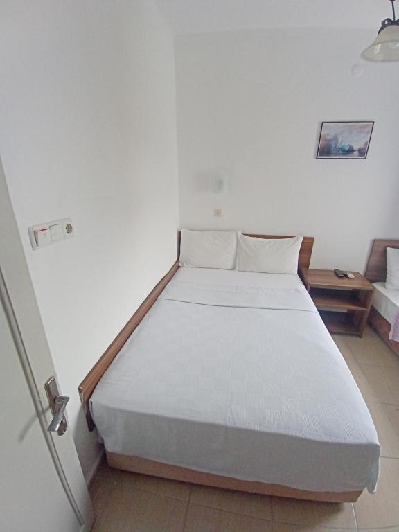 Postel nebo postele na pokoji v ubytování Pay Otel