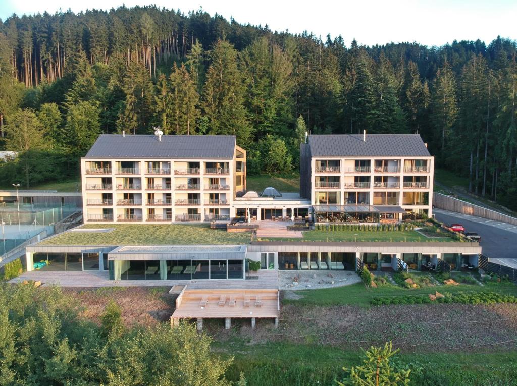 an aerial view of a hotel with a large building at ENDEMIT Boutique Hotel & Spa in Horní Bečva