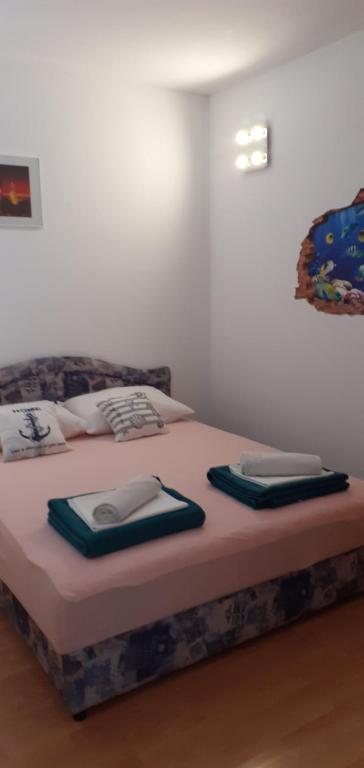 Postel nebo postele na pokoji v ubytování Villa Palfi