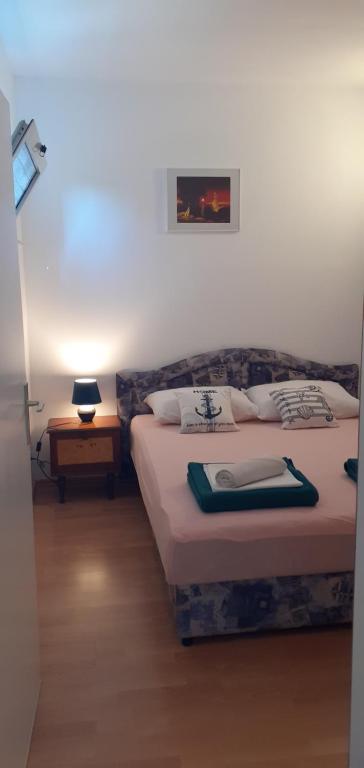 Postel nebo postele na pokoji v ubytování Villa Palfi