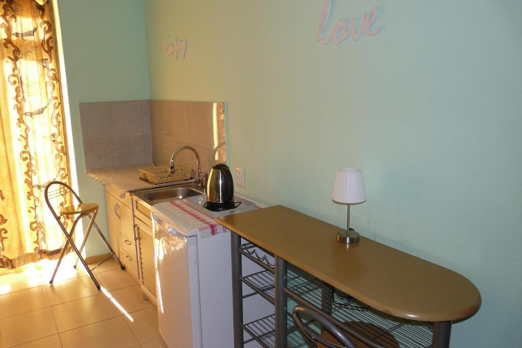 Kuchyň nebo kuchyňský kout v ubytování Why Me Eco-friendly Rooms