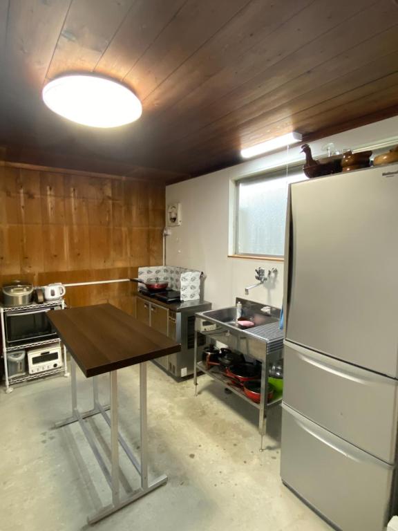 Kuchyň nebo kuchyňský kout v ubytování anakashico Hostel Kumano Kodo