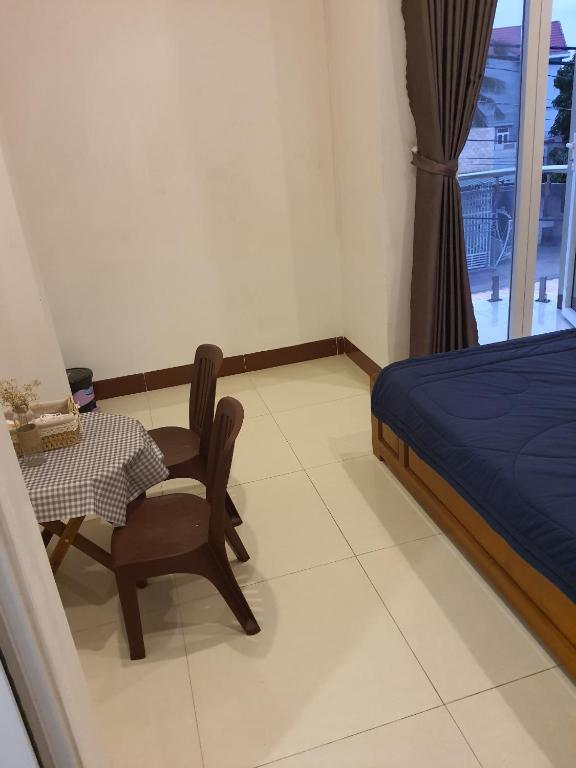 Giường trong phòng chung tại Homestay Hoài Tâm Phan Thiết